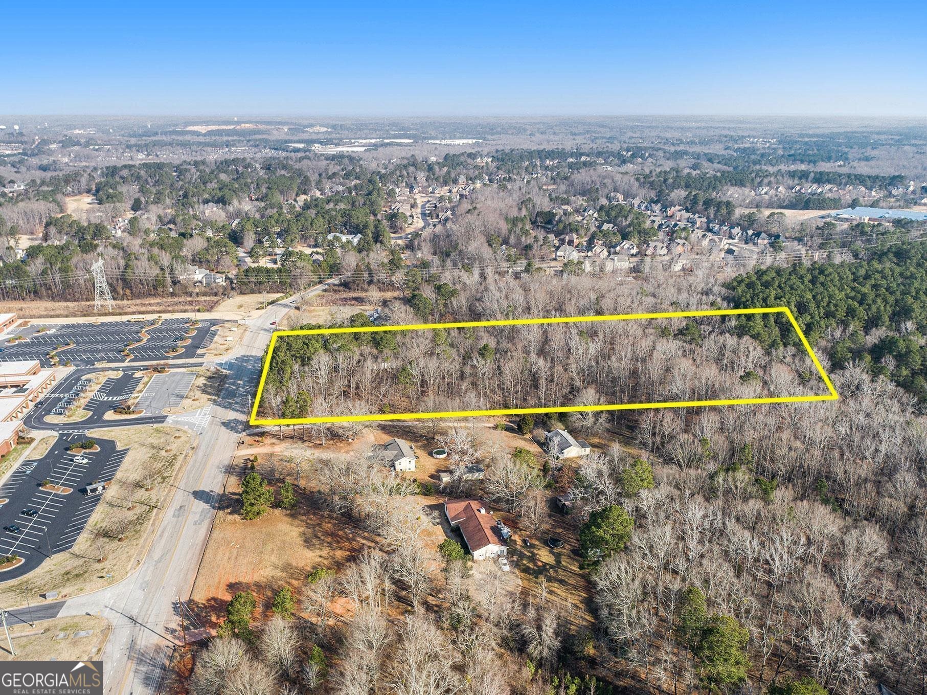 1.5 miles from the new Bridges at Jodeco Development with new Costco, Spouts, Starbucks, Chick-fil-a! AMAZING LOCATION IN FRONT OF EAGLES LANDING SCHOOLS! Call your builders/developers! You do not want to miss out on this one! Build homes in fast growing McDonough, GA. This property is directly across from Eagles Landing High School and Eagles Landing Middle School.