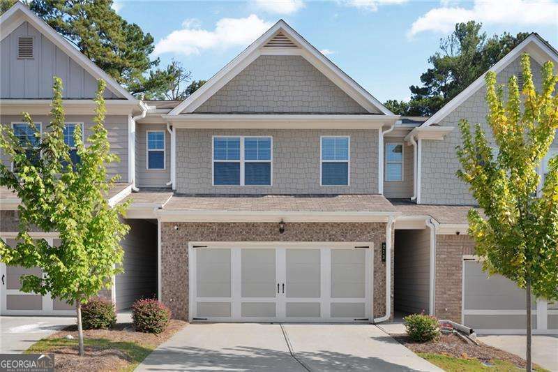 Welcome to 213 Yellowwood Way, where charm, open space, and location come together in one incredible opportunity! Nestled in the heart of Woodstock, this beautifully maintained home offers everything today's buyers are searching for-at a newly reduced price that won't last long! Step inside to find a bright and open layout with spacious living areas, high ceilings, and tons of natural light. The kitchen is perfect for entertaining with ample counter space, stainless steel appliances, and a seamless flow into the family room. Enjoy generously sized bedrooms, including a luxurious owner's suite with a spa-like bath and walk-in closet. The modern kitchen and private backyard is ideal for relaxing or hosting friends, and the community amenities add to the lifestyle! Park at Camden is conveniently surrounded by plenty of shopping, dining, and entertainment, the Outlet Shoppes, Shops at Trickum, The Centre at Woodstock, and several area golf clubs. This subdivision also allows easy access to dog parks and Dupree Park, an area featuring basketball and tennis courts, fitness stations, and nature trails: a place perfect for hiking and biking. Located just minutes from downtown Woodstock, top-rated schools, dining, and shopping, this is the home you've been waiting for-and at just $419K, it's the best value in the area! Move in ready for quick closing!
