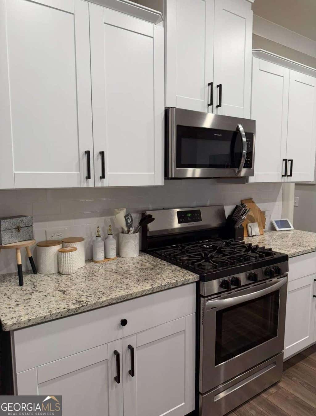 Photo of 6458 Lanier Harbor Landing, Buford, GA 30518 (MLS # 10822597)
