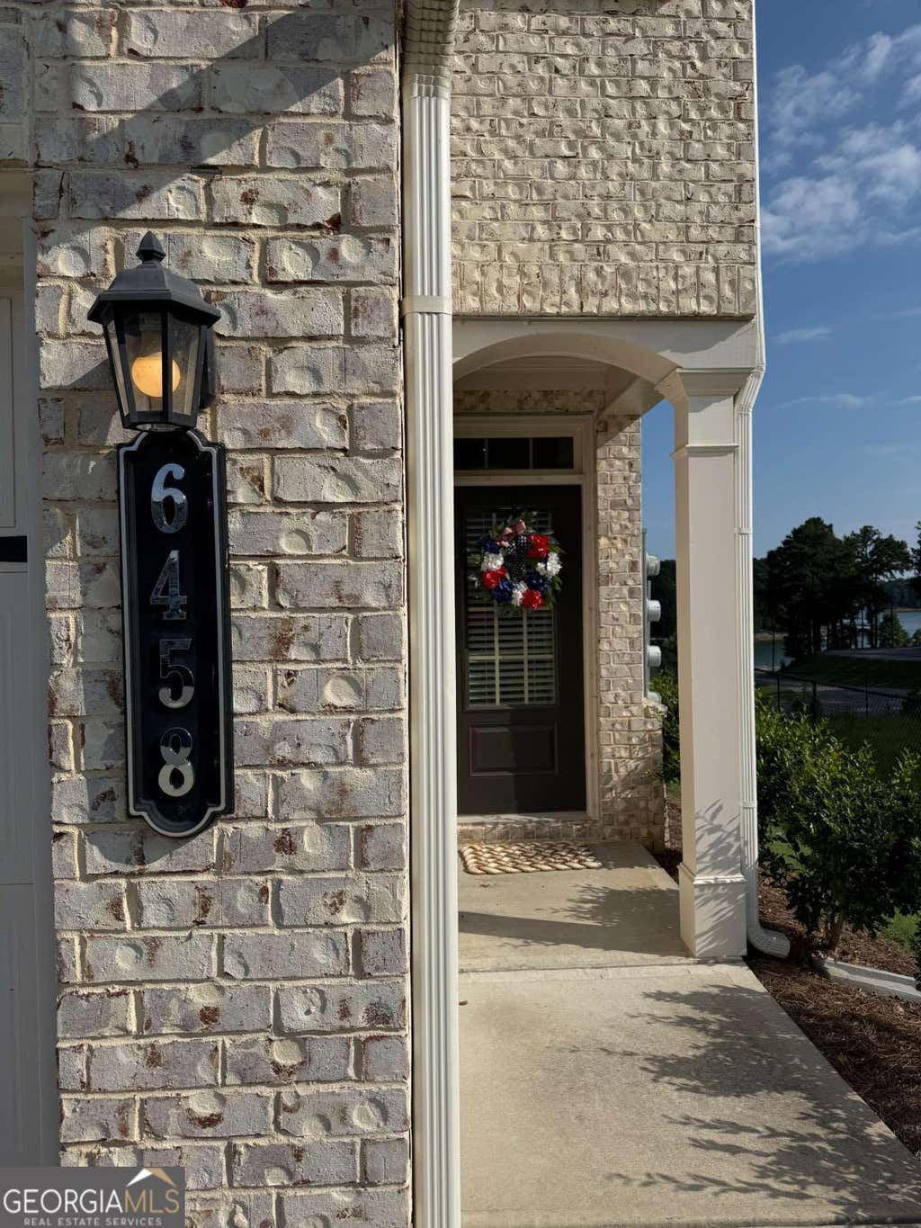 Photo of 6458 Lanier Harbor Landing, Buford, GA 30518 (MLS # 10822597)