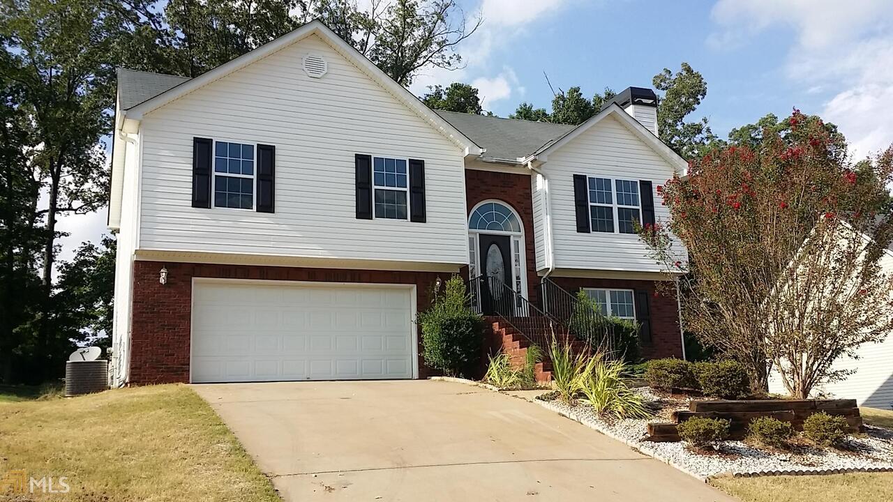 Entire house has just been renovated! Brand new flooring, new paint, new appliances, new fixtures. Realize your dream of a new Home by taking advantage of this Beautiful 4 bedroom / 3 bath house with 2 car garage The back deck is ideal for coffee in the morning or hanging out with friends and family in the cool of lovely Summer evenings!! Located only minutes away from the All the attractions of Covington, this house offers peace and quiet within stone throw way from all the business you might want!!