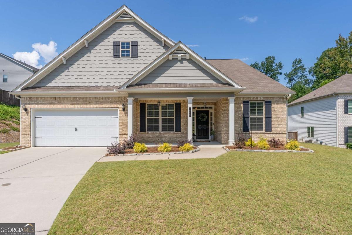Welcome to this MOVE-IN READY RANCH that combines style, function, and comfort in one of the area's most popular neighborhoods. From the moment you arrive, you'll be impressed by the quiet cul-de-sac, curb appeal, and manicured landscaping that set the tone for what's inside. Step into a FRESHLY PAINTED INTERIOR with an open concept layout designed for entertaining. The chef's kitchen features stainless steel appliances, granite countertops, an oversized island, abundant cabinetry, and plenty of natural light throughout the living spaces. Outside, you'll love the level, FENCED backyard and COVERED PATIO that is perfect for gatherings or quiet evenings at home. The generous owner's suite is a true retreat with a sitting area that opens directly to the covered patio. The spa-like bath offers an impressive walk-in shower with dual shower heads and a large bench, plus an extraordinary walk-in closet. Storage is unmatched in this home! Enjoy a walk-in attic, thoughtfully designed closets, and an oversized BONUS ROOM upstairs with a full bath and two additional closets. Don't miss your chance to own this one-of-a-kind ranch with all the upgrades you've been searching for! Additional highlights include TOP RATED SCHOOLS, desirable community amenities, and low HOA fees. Conveniently located within 20 minutes of Cumming City Center, Historic Downtown Ball Ground, and the North Georgia Premium Outlets in Dawsonville. The new Coal Mountain Town Center, currently under development, is just 10 minutes away and will feature shopping, dining, and entertainment. The North Georgia mountains and wineries are an easy 45-minute scenic drive. This home truly has it all! Schedule your showing today.