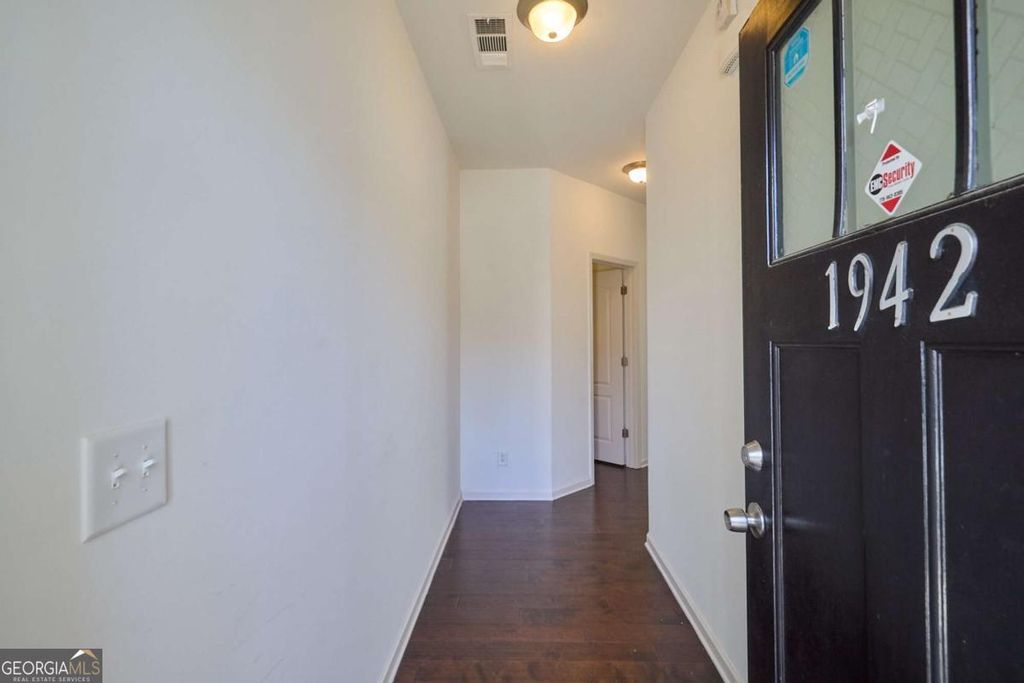 Photo of 1942 Paxton Ridge Ct, Lilburn, GA 30047 (MLS # 10674625)