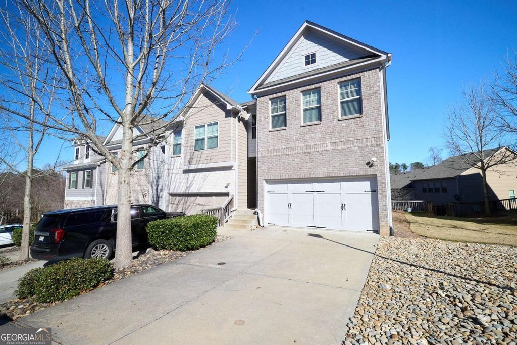 Photo of 1942 Paxton Ridge Ct, Lilburn, GA 30047 (MLS # 10674625)