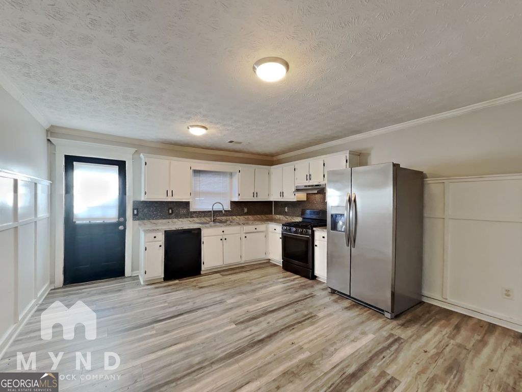 Photo of 5801 Meadowview Road, Rex, GA 30273 (MLS # 10688207)