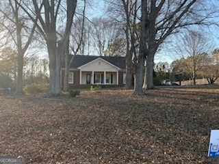 Bring you horses, cows and chickens! No HOA!!! Own you mini farm in Milton and walk to Summit Hill Elementary. All brick home on 2.94 acres. Has sheds and pasture. Large kitchen with breakfast room. Entertain in your large dining room located off of kitchen. Home has a nice family room with fireplace along with a large sitting room. Separated bedrooms with large primary with private bath. Finished basement with bedroom, kitchen and bathroom. Large trees provide a tranquil setting Basement was built in 1967. Seller hired an architect to custom build home in 2003.