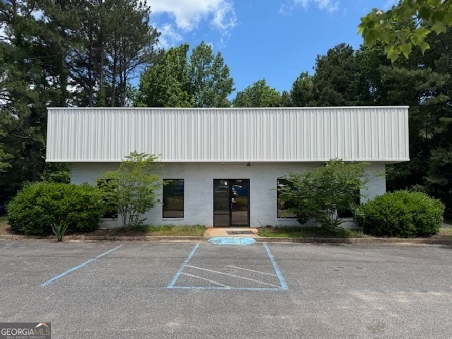 For Lease - Freestanding Flex/Warehouse Space in Prime Alpharetta Location  4073 Nine McFarland Drive | Alpharetta, GA 30004  Forsyth County | 5,000 SF | Zoned Industrial | Automotive Uses Not Permitted    Presenting a rare warehouse/flex opportunity in sought-after Alpharetta. This 5,000 SF freestanding industrial building offers excellent versatility and visibility, ideal for a range of business types-landscapers, contractors, showrooms, storage, light manufacturing, and more.    Located just 2.6 miles from GA 400, near Dunkin' Donuts at McFarland Parkway and Highway 9, and minutes from Halcyon, this property is positioned for both operational efficiency and regional access. With the newly widened Highway 9 just 100 yards away, logistics and employee access are seamless.    Property Highlights:  Size: 5,000 SF total, freestanding structure    Office Buildout: Approx. 656 SF including one executive office, large bullpen space, restroom, and shop sink    Loading: Multi-use door with both drive-in and dock-high access    Power: 3-Phase power with 200-amp service, expandable to 800 amps    Climate Control: Heated warehouse with vented roof, suitable for industrial applications    Construction: Brick front with functional warehouse layout    Zoning: Industrial - No automotive uses permitted    Location Advantages:  Alpharetta address with the ease and tax benefits of Forsyth County    Near Halcyon, Walmart, Mercedes-Benz, Francis Road area, Cumming, Roswell, and Johns Creek    Excellent connectivity to major roadways and workforce    Surrounded by a mix of commercial, residential, and light industrial uses    This is a rare opportunity to secure a functional, well-located industrial property in a high-demand area with flexible usage potential. Ideal for businesses looking for a strong presence in North Metro Atlanta.