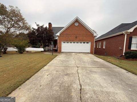 Photo of 1940 Stockton Walk, Snellville, GA 30078 (MLS # 10639985)