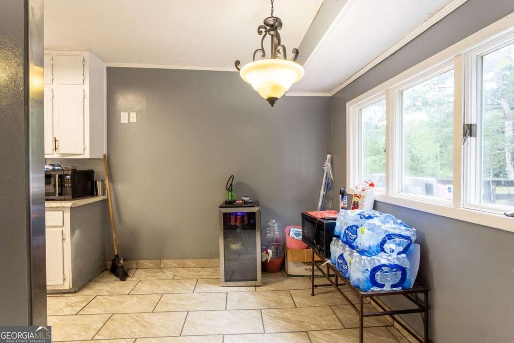 Photo of 1535 Flat Shoals Road SW, Conyers, GA 30094 (MLS # 10692323)