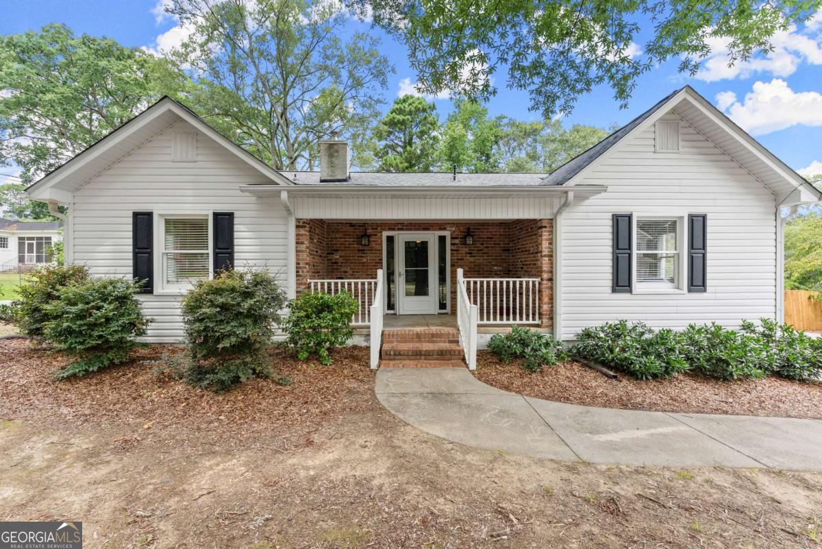 Charming Historic Ranch in the Heart of Winder! This beautifully maintained 3-bedroom, 2-bath home offers a perfect blend of historic charm and modern updates, all within the city limits of Winder. This home features an inviting open-concept layout, highlighted by true hardwood floors and an abundance of natural sunlight throughout. The updated kitchen includes granite countertops and stainless steel appliances, flowing seamlessly into the main living space. The spacious master suite features an updated en-suite bath, while two additional bedrooms offer flexibility for guests, kids, or a home office. Enjoy the outdoors in the large, fenced-in backyard complete with an outbuilding-ideal for storage, hobbies, or extra workspace. Just a short walk to the new Winder Legacy Park, local shopping, and dining options-this prime location offers convenience and lifestyle all in one! Don't miss this opportunity. Schedule your private showing today!