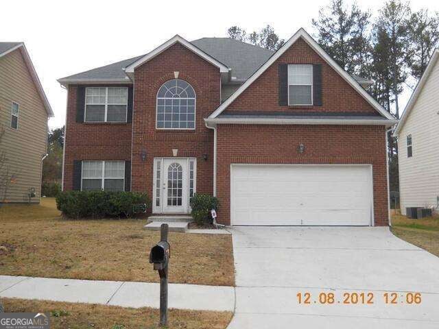 Photo of 7517 Poplar Falls Trail, Lithonia, GA 30058 (MLS # 10873810)