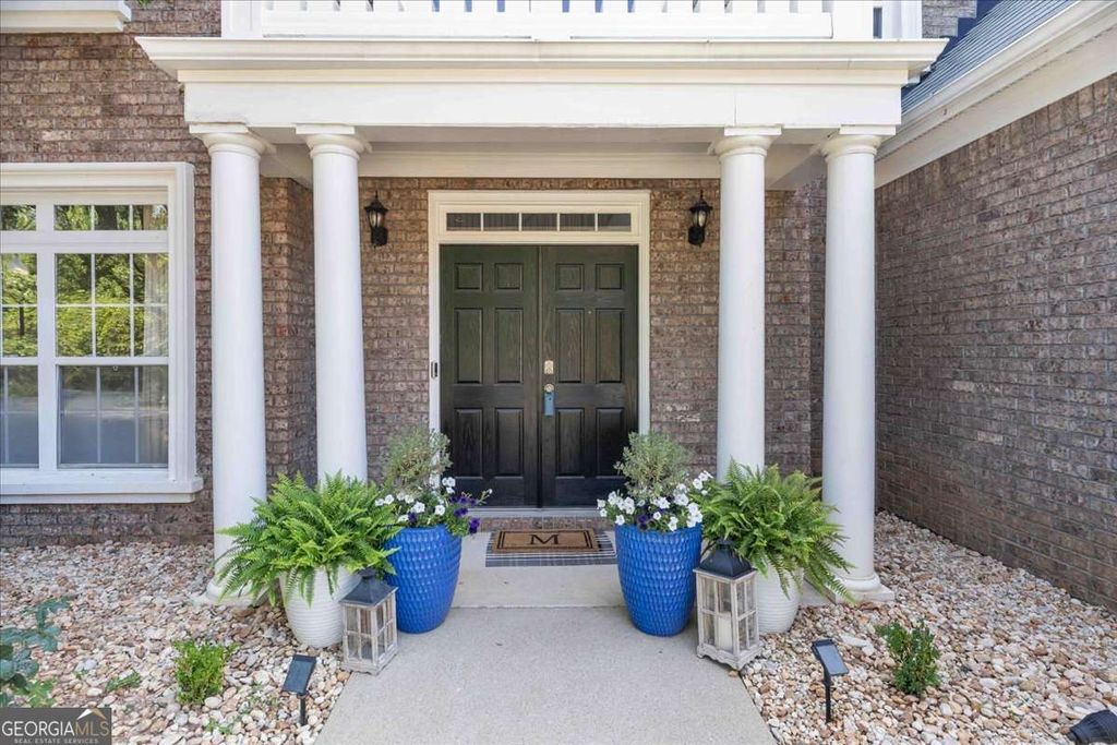 Photo of 3123 Wolf Club Dr. Dr SW, Atlanta, GA 30349 (MLS # 10657900)