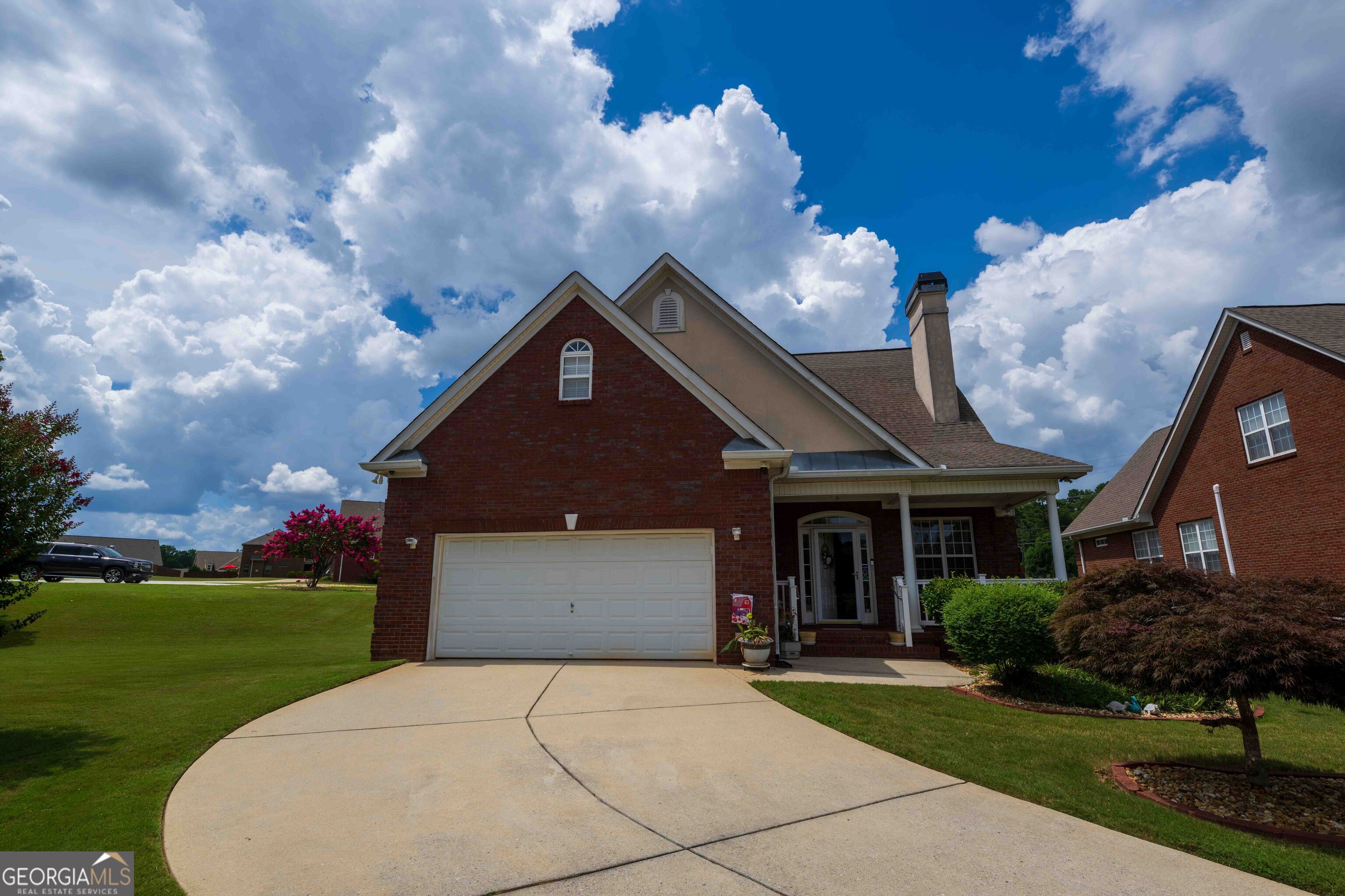 Welcome to 2080 Spivey Village Trace - a spacious 4-bedroom, 2.5-bath home nestled in the sought-after gated community of Spivey Village. This beautifully maintained property offers the perfect blend of comfort, function, and style. Step inside to find a bright, open floor plan featuring a generous living area, a formal dining room, and enclosed rear porch. The oversized owner's suite is located on the main level, complete with a walk-in closet and a private en-suite bath featuring a double vanity, soaking tub, and separate shower. Upstairs, you'll find three additional bedrooms and a full bath-perfect for guests, a home office, or growing household needs. The home also includes an open backyard and a two-car garage. Located just minutes from Lake Spivey, shopping, dining, and with easy access to I-75, this home offers the convenience you need in a quiet, well-kept neighborhood. Don't miss your chance to own in one of Jonesboro's most desirable communities! Seller will be hosting an estate sale on Saturday August 2nd (10a-3p)