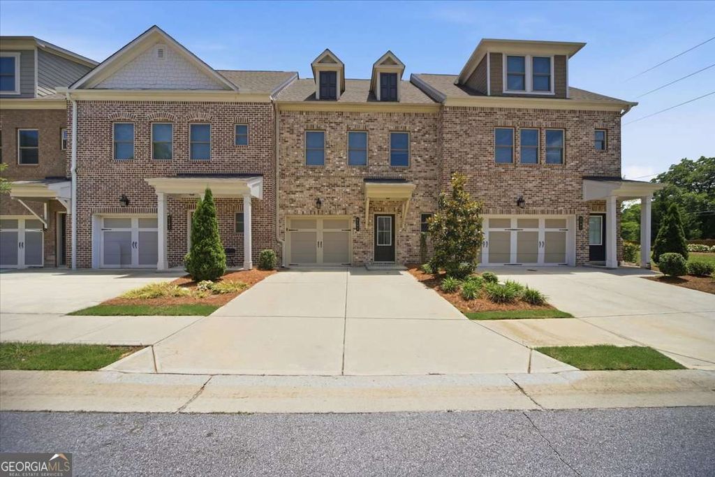 Photo of 4192 Moncure Drive, Lilburn, GA 30047 (MLS # 10776936)