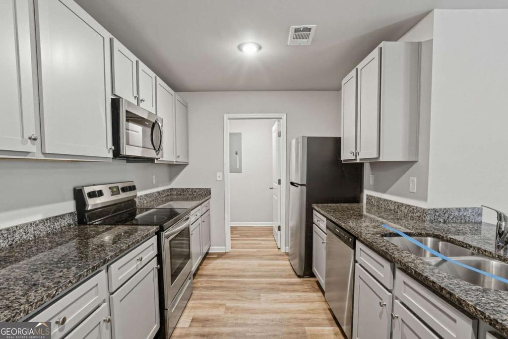 Photo of 122 W Lexington Avenue, Griffin, GA 30223 (MLS # 10719068)