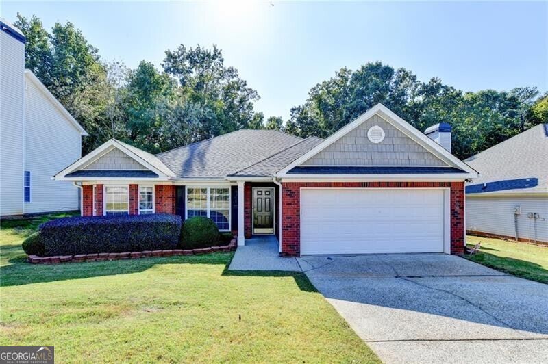 Photo of 2068 Wildcat Cliffs Lane, Lawrenceville, GA 30043 (MLS # 10872851)