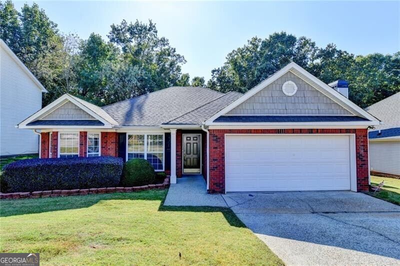 Photo of 2068 Wildcat Cliffs Lane, Lawrenceville, GA 30043 (MLS # 10872851)
