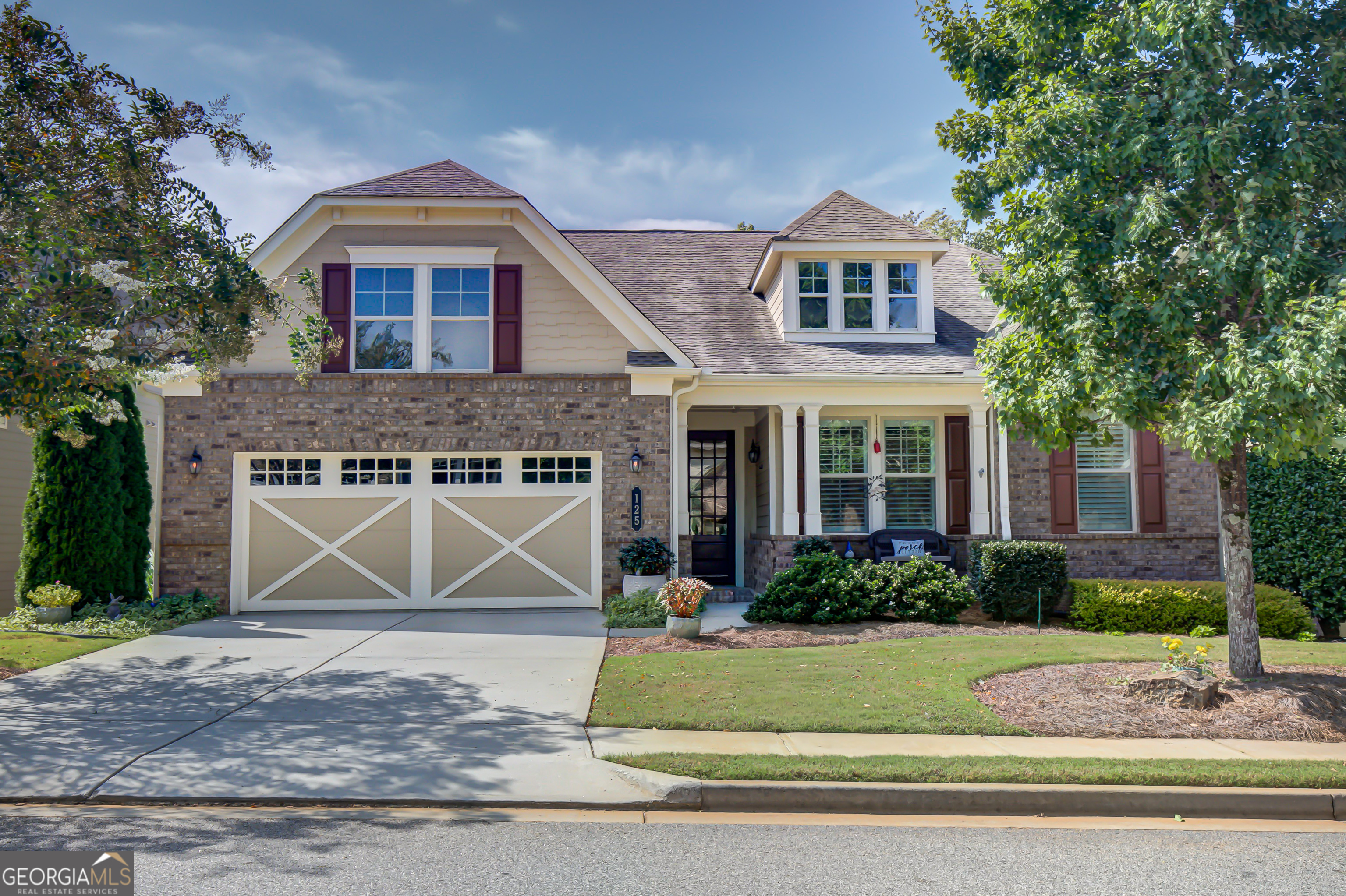 Welcome to this former model home, loaded with upgrades! The popular Maple floor plan is located in the highly desirable Cresswind community of Peachtree City. As you enter the foyer, you'll notice upgraded engineered hardwood floors, 8-foot doors, upgraded trim package throughout, plantation shutters, and an open-concept layout. The gourmet kitchen features a large island with breakfast bar, gas cooktop, stainless steel appliances, tile backsplash, and a spacious pantry. The kitchen and dining area flow seamlessly into the family room and out to the extended oversized screened porch overlooking the private wooded backyard. The main-level owner's suite is filled with natural light and boasts a spa-like bath with a frameless shower, dual vanities, private water closet, large linen closet, and walk-in closet. Two additional bedrooms on the main level share a Jack-and-Jill bath. The newly finished terrace level includes a bedroom with lots of natural light, full bathroom, kitchenette with sink and refrigerator, a large family room, and two office/flex spaces, plus a generous unfinished storage area. Additional highlights include a 2-car garage, 20amp outlet in garage, upgraded lighting package, and low-maintenance living in one of Peachtree City's most vibrant 55+ active adult communities. Furniture is negotiable.