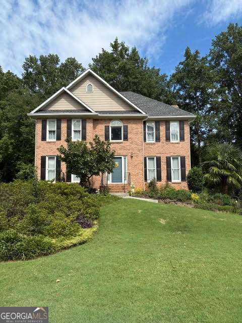 Welcome to This Immaculately Maintained 3-Story Brick-Facing Home - Where Timeless Elegance Meets Modern Comfort! Nestled in the tranquil, highly sought-after Milford Chase neighborhood, this charming residence perfectly balances classic style with contemporary upgrades. From the moment you step inside, you'll be greeted by gleaming hardwood floors that flow seamlessly throughout the entire home. This home is an entertainer's dream, while still offering cozy spaces perfect for everyday family life. At the heart of the home lies a beautifully open kitchen including a brand-new fridge and dishwasher. Whether you're hosting a dinner party or preparing a family meal, this kitchen offers the perfect blend of function and style. The expansive living and dining spaces are designed for comfort and elegance. Large windows invite natural light to fill the rooms, creating a bright, welcoming atmosphere perfect for both casual gatherings and special occasions. Step outside to discover a custom-designed garden that overlooks a peaceful creek, providing a serene backdrop for outdoor entertaining or simply enjoying nature's beauty. The backyard is a true highlight of the home, offering both privacy and tranquility. Upstairs, you'll find newly installed hardwood flooring that complements the spacious master suite, which features both his and her closets and freshly painted walls for a modern, updated feel. Plus, the convenience of an upstairs laundry room ensures that chores are a breeze! This home is conveniently located near shopping, dining, and major highways, offering easy access to everything you need while still maintaining a sense of privacy and peace. This home truly has it all-classic charm, modern upgrades, and a spacious layout perfect for both family living and entertaining.
