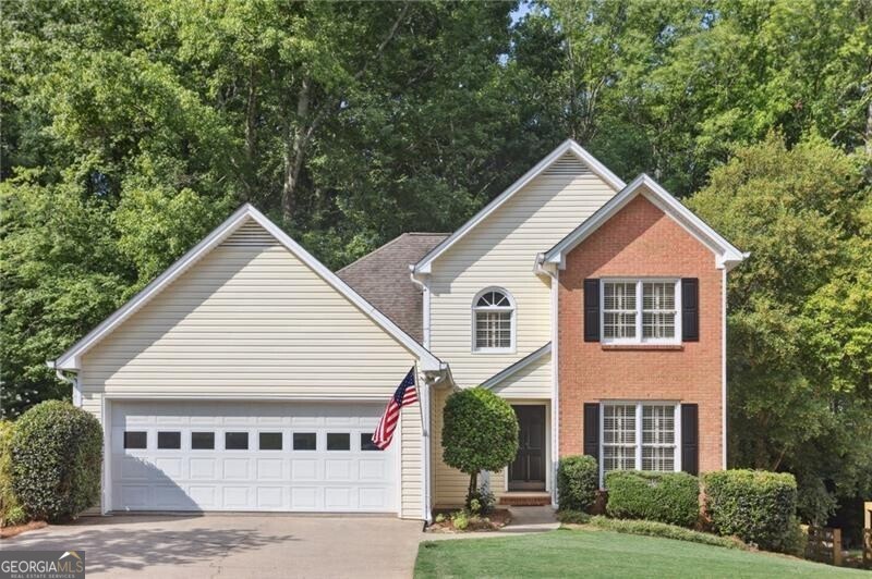 Sought after Marietta City location just off Kennesaw Avenue in the charming small neighborhood, The Oaks. All new interior paint, new carpet and lighting. You will love the primary Suite being on the main level and having three additional bedrooms on the second floor plus a full unfinished basement that is great for storage or easy to finish. Spacious kitchen with eat in breakfast room plus separate dining room or could be used as an office. Family room with cozy fireplace adjoins the newly remodeled back deck that overlooks the level backyard with tons of space and deep wooded backyard. Walk to downtown Marietta from this location or hop on the sidewalk and enjoy all the many trails of Kennesaw Mtn. Level Drive driveway, cut-de-sac lot and ready to move into home. Pre-list appraisal for list price gives you confirmation of the value of this home.