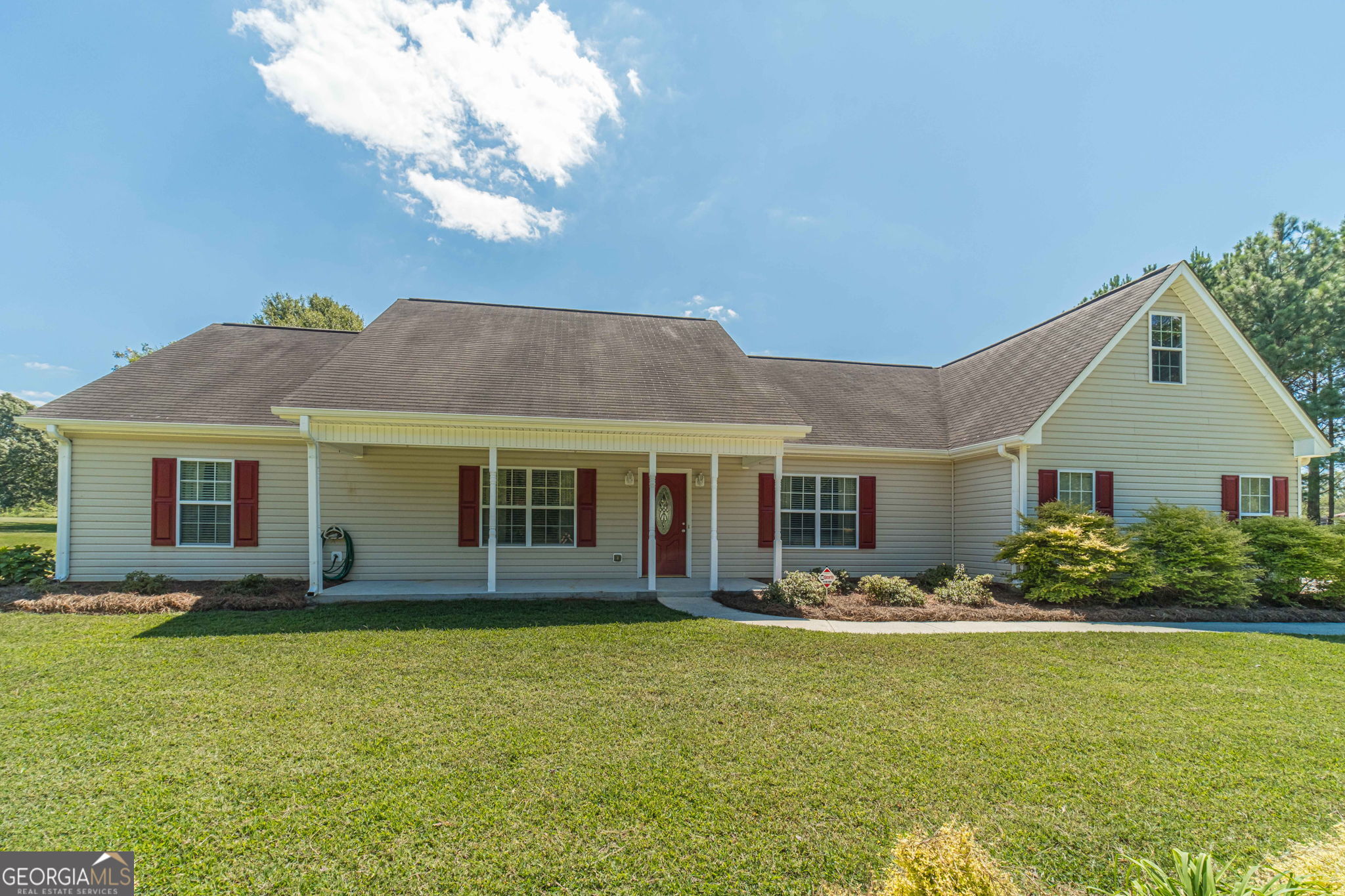 USDA 100% Financing Eligible Property! Stepless Ranch Home with Beautiful Level 2.05+-Acre Lot Awaits You! Welcome to 1725 Double Bridges Rd! NO HOA, BRING THE RV, CHICKENS AND MORE-This home features, not 1, but 2, Outbuildings, great for storing cars, wood working, storing business equipment or creating a detached game room! One building is 20x20 with a huge paved covered area while the 2nd garage is 10x20 with poured concrete covered area. The Exterior is low maintenance with an Oversized Rocking Chair Front Porch-Great for Watching the Deer! Interior has been Recently Renovated with LVP Flooring Throughout! The Family Room is Generously Sized with a Stone Fireplace! The Eat in Kitchen is located off of the side entry garage and has a beautiful subway tile backsplash, sink overlooking the backyard, Solid Cabinets with Stainless Steel Appliances and Granite Countertops with Breakfast Bar! Owner suite On The Main Level with LVP Flooring/Ceiling Fan and Resort Style Owners Bath with Tile Shower-Soaking Tub-Tile Flooring and Walk in Closet. 2 Secondary Bedrooms on the main level-Unfinished Bonus room above the garage great for storage or future finished room! Exterior is nicely landscaped-Backyard is Fenced in with plenty of room for future growth if needed! Patio great for entertaining or grilling! This home has it all with the comfortable small town feel! Must see to appreciate! Call The Minton Team to Schedule a Showing Today!