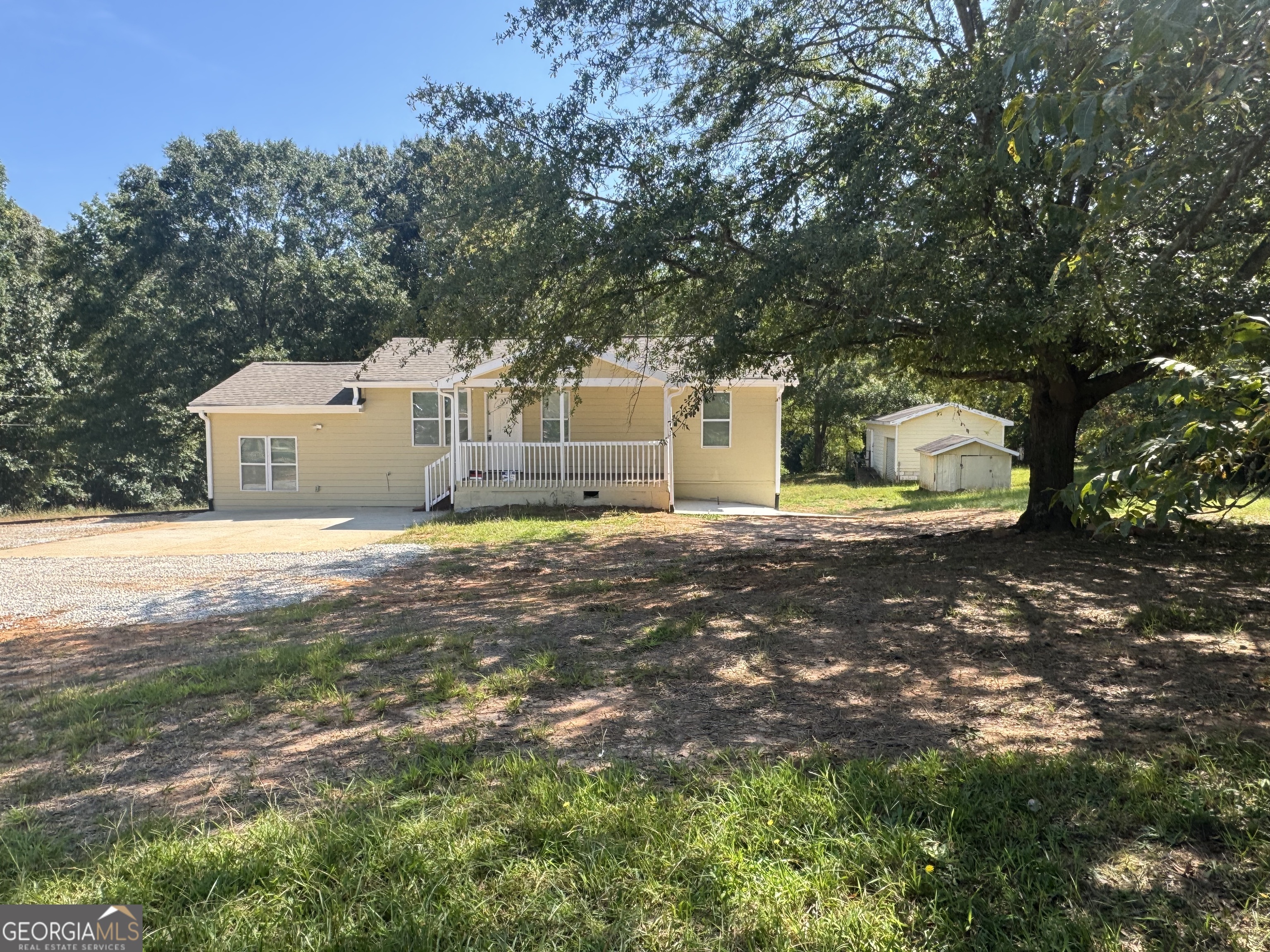 Recently renovated home on over 4 acres located close to expressway and Eagles Landing. 5 bedrooms with a split feature plan that would be great for roommates. 3 full baths with new tile and fixtures. Kitchen with granite counters, tile floors, and all new stainless steel appliances. Family room with tile floors, separate bonus room or den with tile floors and a third living space downstairs.
