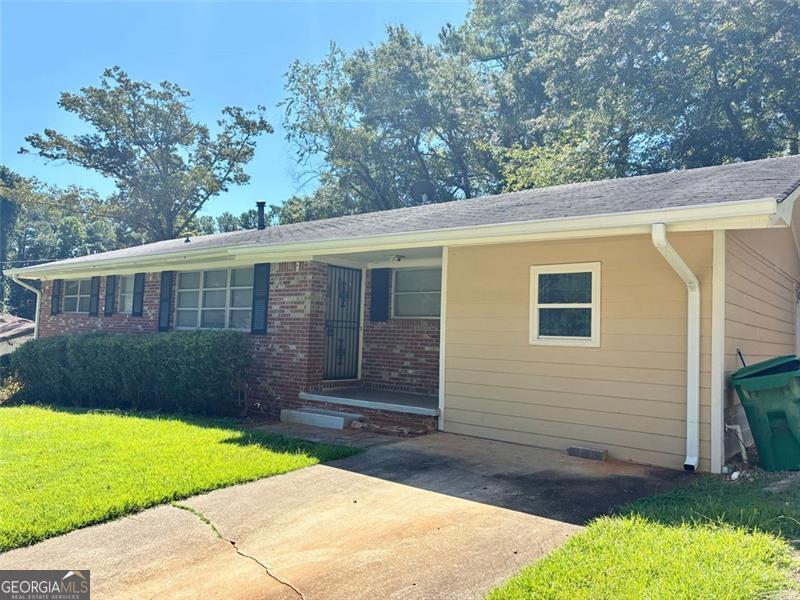 Affordability inside I-285!! Perfect 1st starter home, downsizing home, or investment property with the potential of 4 bedrooms. This home qualifies for Down Payment Assistance. Ask Listing Agent for more info. Welcome to this charming all-brick ranch home with good solid bones! Perfectly situated on a quiet street with friendly neighbors who look out for one another, this move-in-ready home offers both comfort and versatility. Inside you will find a spacious open layout. Upon walking in the front door, you step into the light-filled living room with original hardwood floors. The living room opens to the dining room, kitchen and hallway leading to the bedrooms. Envision your furniture in the spacious bedrooms. The primary bedroom has it's own half-bathroom. PLUS, there is a bonus room that can serve as a family room, den, home office, or even a fourth bedroom-ideal for customizing to your needs. Enjoy outdoor living by relaxing on the front porch in a comfy rocking chair, or having a BBQ on the back patio overlooking a large, beautiful fenced backyard, perfect for family relaxation time and entertaining. There is also a partial unfinished basement ready for your personal touch or extra storage. Recent updates include a roof approximately five years old and a new furnace installed in 2024, ensuring worry-free living. Whether you choose to update the home or leave it as is, you'll find it offers great potential in an established community close to shopping, schools, major highways, retail centers, fantastic dining options and the gorgeous Michelle Obama walking trail. This sturdy, well-maintained home combines comfort, location, and potential-don't miss your chance to make this wonderful property your new home! HOME IS BEING SOLD AS-IS! NO BLIND OFFERS WILL BE CONSIDERED.