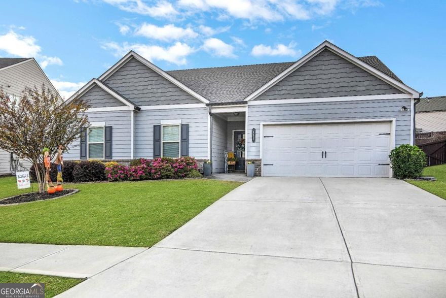 Welcome Home to Auburn Station!  Discover comfort, convenience, and community in this beautifully maintained 3-bedroom, 2-bath ranch located in the highly desirable Auburn Station subdivision. One of only a few single-story homes available, this property blends modern design with family-friendly functionality.  Step inside to an open-concept living area featuring a cozy gas fireplace and a seamless flow to the covered patio-perfect for entertaining or relaxing after a long day. The chef-inspired kitchen boasts a spacious center island, stainless steel appliances, granite countertops, gray shaker cabinets, and a stylish tile backsplash-the perfect space for family meals and gatherings.  Enjoy a split-bedroom floor plan that provides privacy for the owner's suite, complete with a spa-like bathroom featuring a double vanity, soaking tub, and walk-in shower. The large walk-in closet offers ample space for storage and organization. Two additional bedrooms with walk-in closets make this home ideal for growing families or guests.  Step outside to a private, fenced backyard-a safe and peaceful retreat for children and pets to play. The covered patio is an inviting spot for morning coffee or weekend barbecues.  Additional highlights include a 2-car garage and access to Auburn Station's resort-style amenities, including a pool with water slide, fitness center, clubhouse, and picnic areas.  Located just minutes from shopping, dining, and the vibrant heart of Auburn, this home offers the perfect blend of comfort, style, and convenience.  Don't miss your chance to make this move-in-ready home yours!