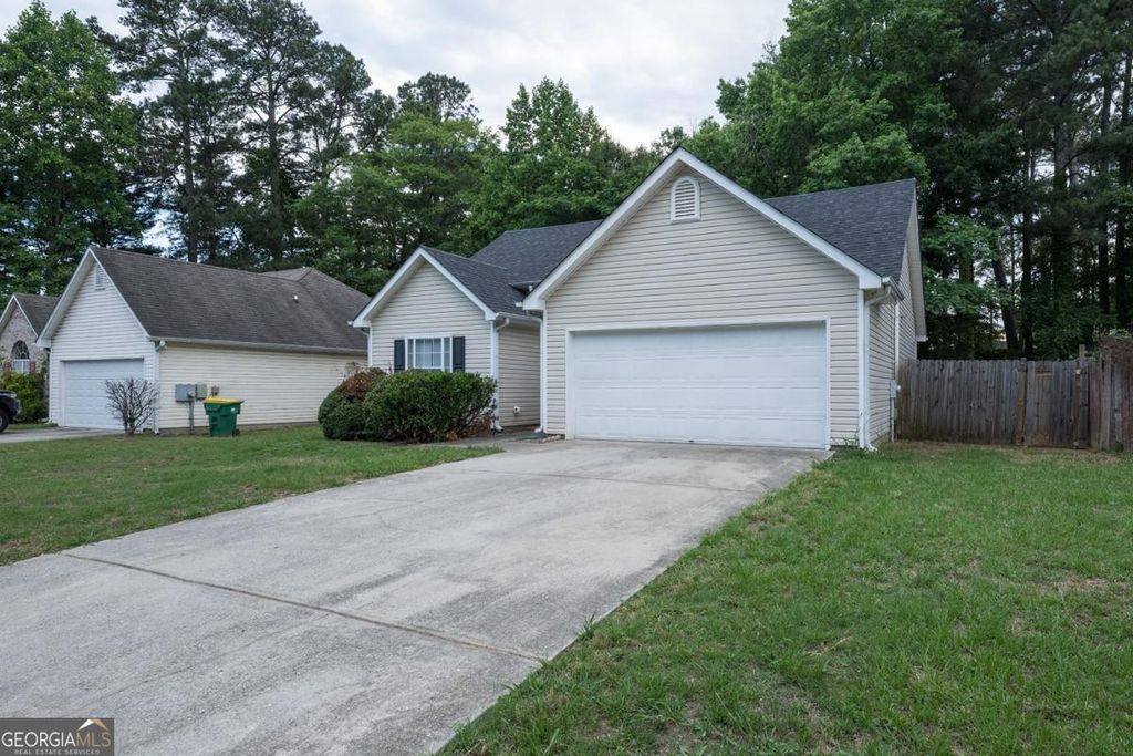 Photo of 5689 Isleworth Way, Atlanta, GA 30349 (MLS # 10770400)
