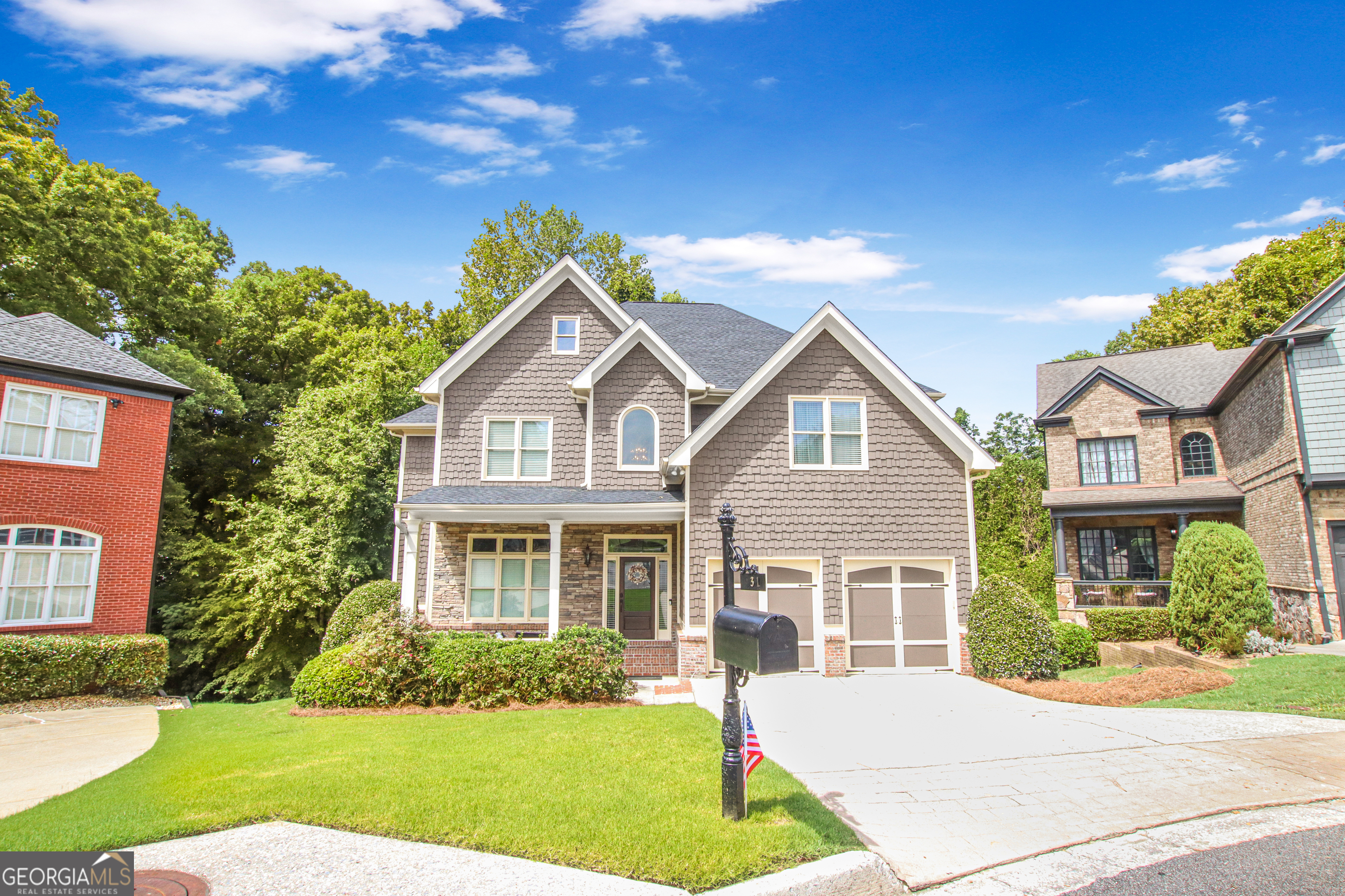 Exceptional Home in Prime Smyrna Location - Walking distance to the sought-after King Springs Elementary! Welcome to this stunning, well-maintained home located in a quiet cul-de-sac within the desirable King Springs Elementary School district. Home with brand-new roof, this home features 5 spacious bedrooms and 4 full bathrooms, including a guest suite on the main level. Enjoy the elegance of a two-story foyer, coffered ceilings, crown molding, and upgraded trim throughout. The gourmet eat-in kitchen boasts granite countertops, stainless steel appliances, and hardwood floors, opening to a large two-story great room with a cozy wood-burning fireplace. Retreat to the oversized Master suite with a large walk-in closet and a spa-like bath featuring dual granite vanities and a whirlpool tub. A basement with a walkout terrace level provides additional living and entertaining space. Located between Oakdale and North Cooper Lake Parks and close to the Silver Comet Trail, Smyrna Market Village, and Truist Park. Convenient access to dining, shopping, and recreation make this home a true gem! Key Features: 5 Bedrooms / 4 Bathrooms Guest Suite on Main Level Two-Story Foyer & Great Room Gourmet Kitchen w/ Granite & Stainless Steel Appliances Hardwood Floors Throughout Main Oversized Owner's Suite w/ Spa Bath Basement with Walkout Patio New Roof Located in King Springs Elementary School District Close to Parks, Trails, Dining & Entertainment Schedule your showing today - this one won't last!