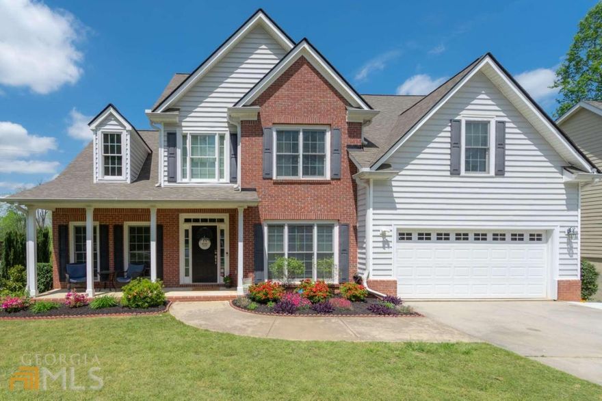 Stop the car and check this home out!!! Cherokee taxes, close to Downtown Woodstock, Roswell & Alpharetta, great schools, granite chef kitchen open to family room. Very large walk in pantry, mud room off garage, hardwood floors, bedroom & full bath & powder on main. Office with vaulted ceiling, dining room and family room on main. 3 Spacious bedrooms and master up, master walk in closet, trey ceilings, x-large laundry room/utility room up. Full finished basement with 1/2 bath and 6th bedroom , media room , wine cellar and unfinished large storage room. Private Backyard has brand new deck off of kitchen that leads down to large entertaining deck with new woodburning stone fireplace. Community has swim/tennis and playground. This home will check many of your boxes. This is a must see home!