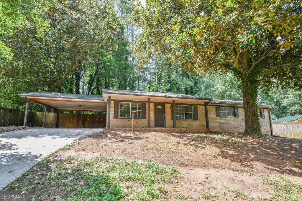 Photo of 2330 Chestnut Log Loop, Lithia Springs, GA 30122 (MLS # 10824607)