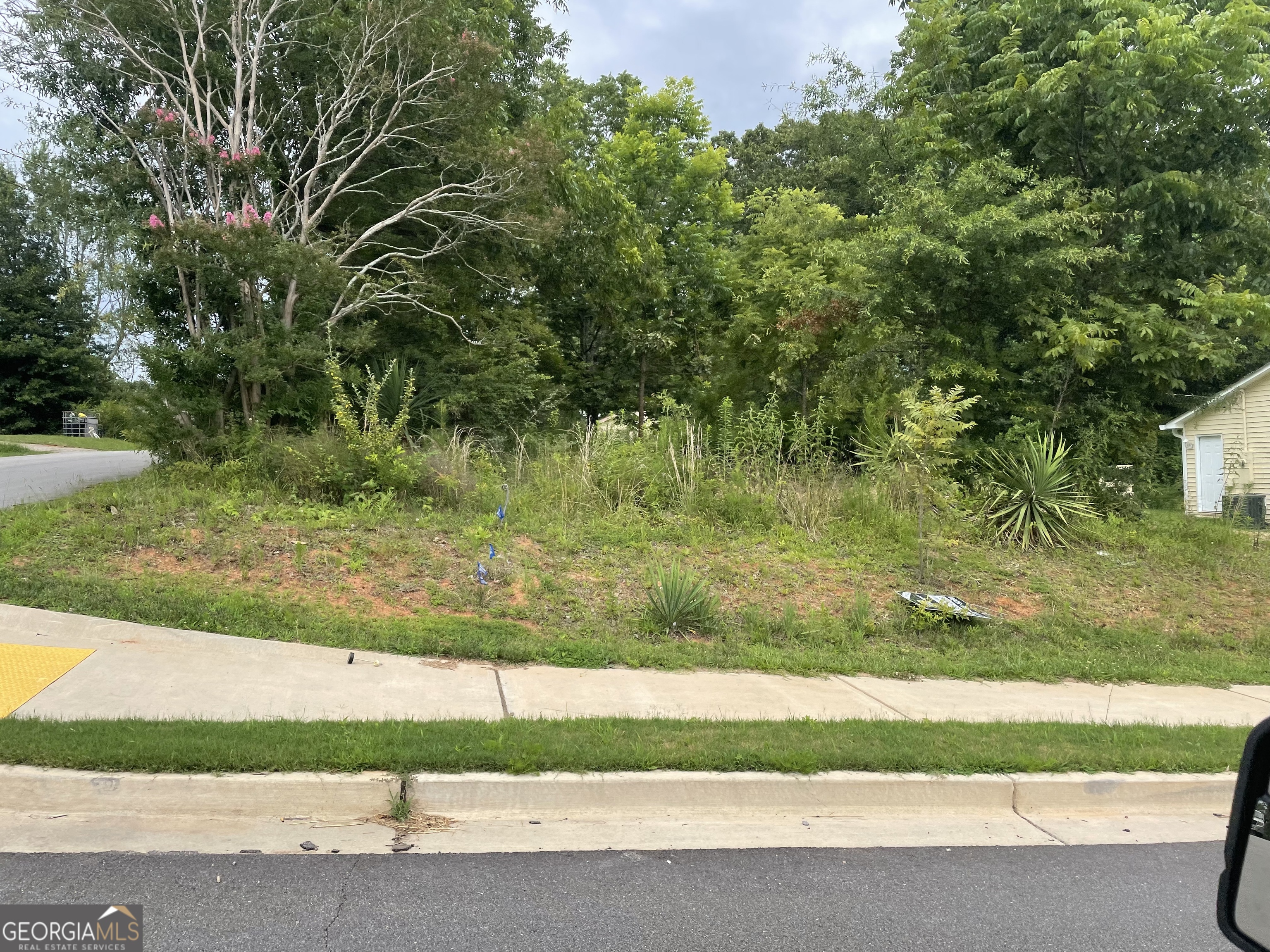 Corner lot located in walking distant to the new Buford High School Football Stadium.