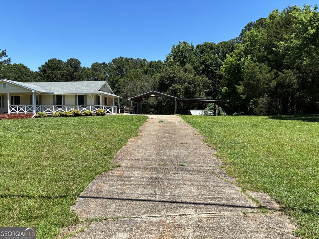 Photo of 1561 Union Grove Church Road, Auburn, GA 30011 (MLS # 10777842)