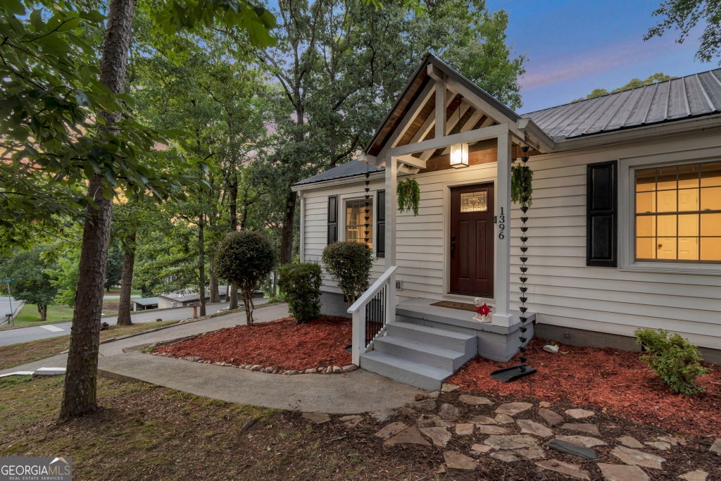 Photo of 1396 Enota Avenue NE, Gainesville, GA 30501 (MLS # 10803616)