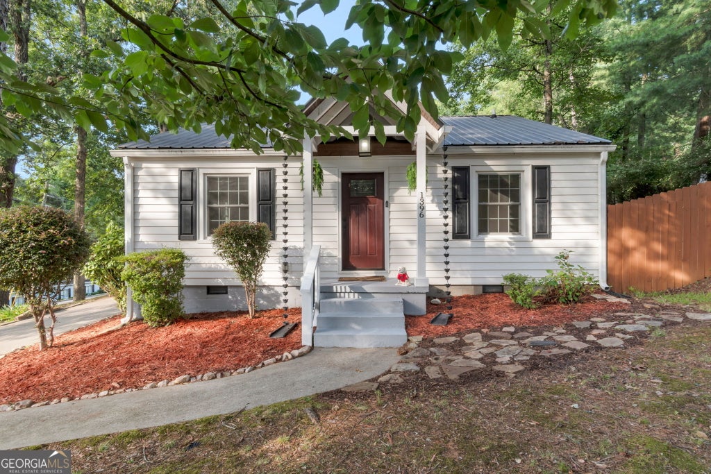 Photo of 1396 Enota Avenue NE, Gainesville, GA 30501 (MLS # 10803616)