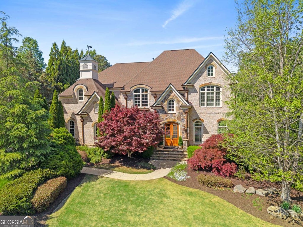 Photo of 3080 Creek Tree Lane, Cumming, GA 30041 (MLS # 10808336)