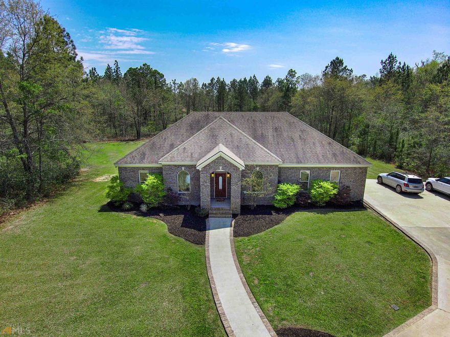 Amazing 3 bed 2 bath home with open floor plan located outside of Brooklet, GA. This home is conveniently located just outside of Brooklet only a few minutes drive into Brooklet or Statesboro.  With a little over 12 acres of land and a beautiful pool out back, it will not take long to picture yourself enjoying all that this property has to offer. Some of the other features offered on this property include a small pond, a large storage building and a perfect fire pit to enjoy while hanging out in the back yard.