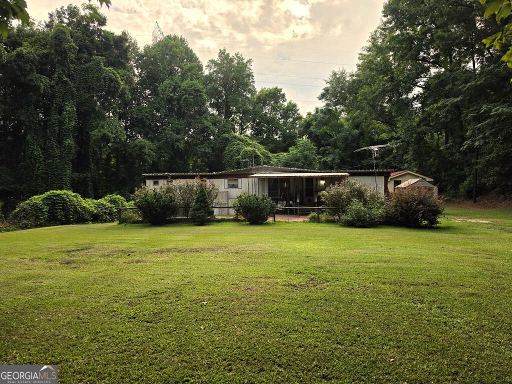 Photo of 21 Dundee Lake Circle, Griffin, GA 30223 (MLS # 10812708)