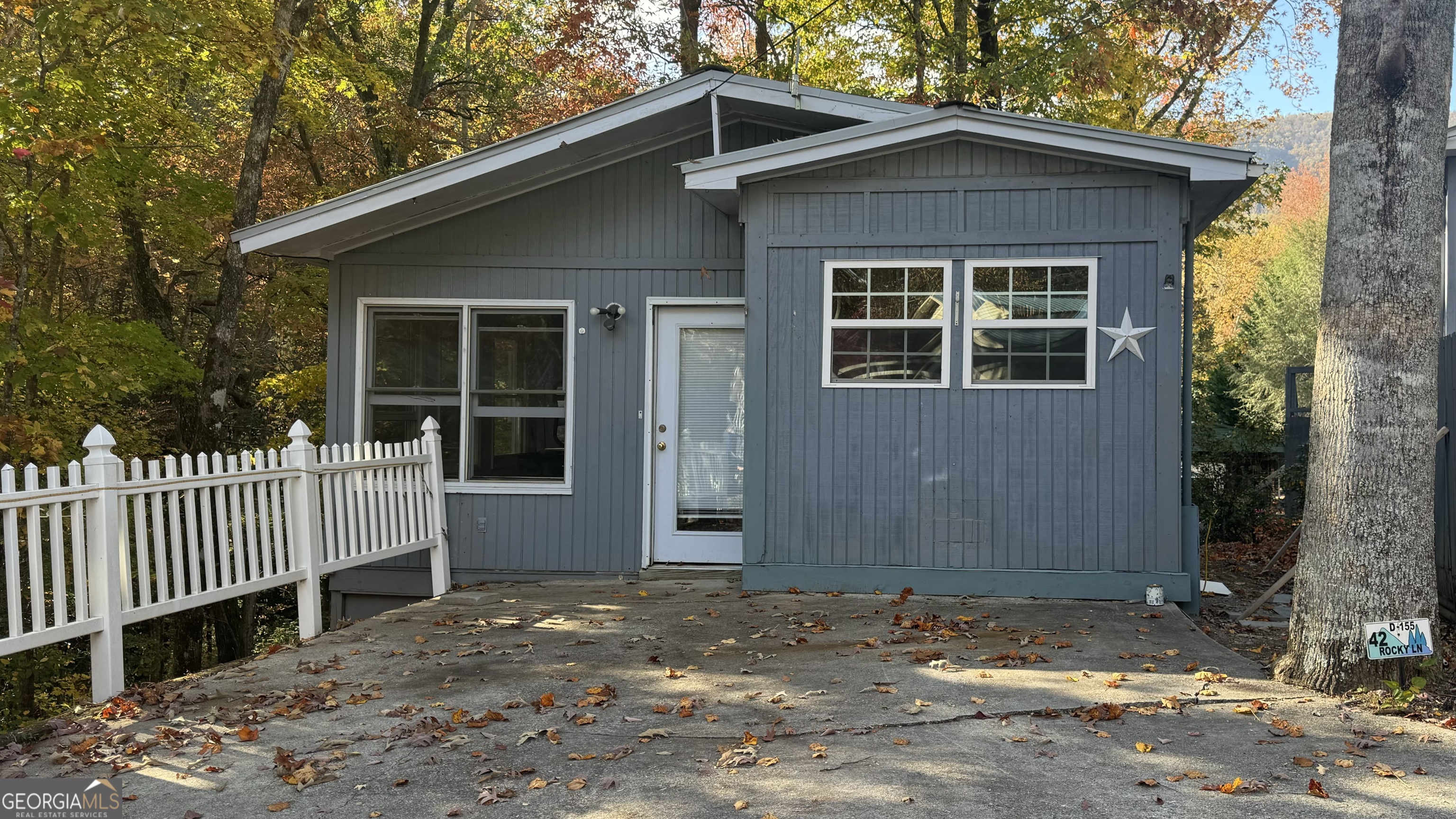 **Seller may Consider Owner Financing! Are you looking to downsize.. or a North GA Mountain vacation getaway for your family? This property offers 1 bedroom, 1 bath home with very low maintenance. The open back deck, needs updating, but will make a great area for grilling and entertaining. With some TLC, this could make a great place for family memories for years to come. The Mountain Lakes community with a 50 acre fishing lake, clubhouse with sauna, steam room, exercise room, indoor and outdoor pool and planned activities. The Resort has horseback riding, a Country Store, diner, waterslide, putt putt and beautiful mountain and lake views! It is conveniently located only minutes from Helen, hiking, waterfalls, local vineyards and more! Schedule your appointment to see it today.