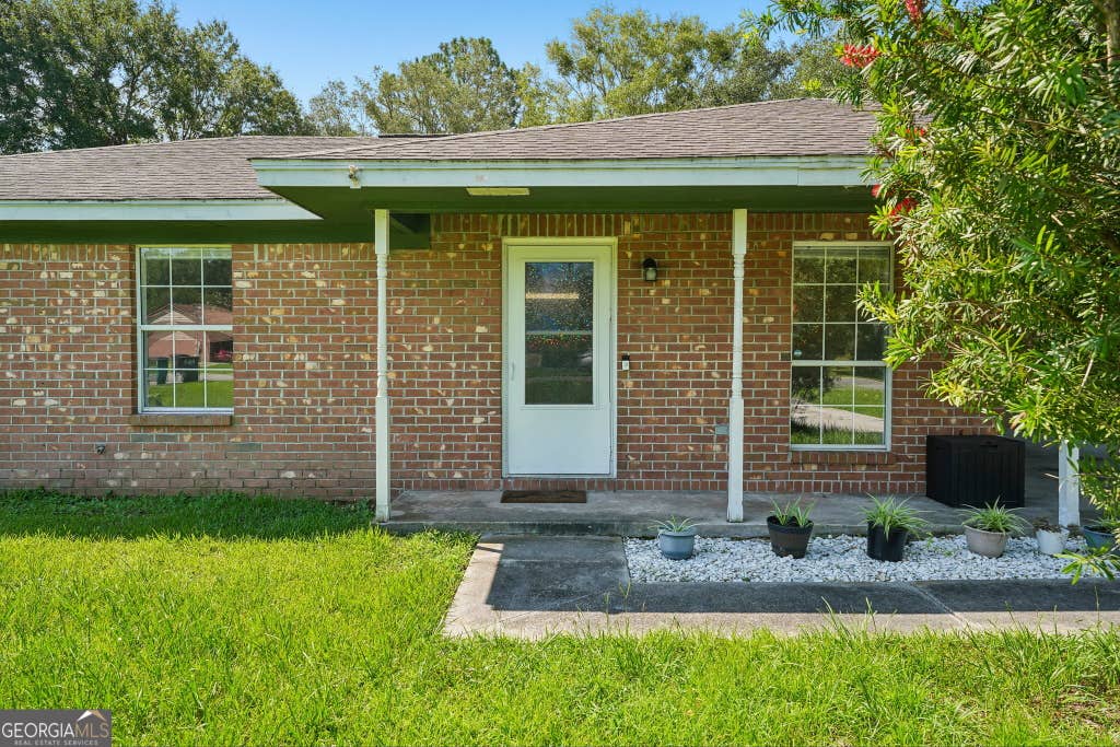 Photo of 310 Watts Street, Saint Marys, GA 31558 (MLS # 10796951)