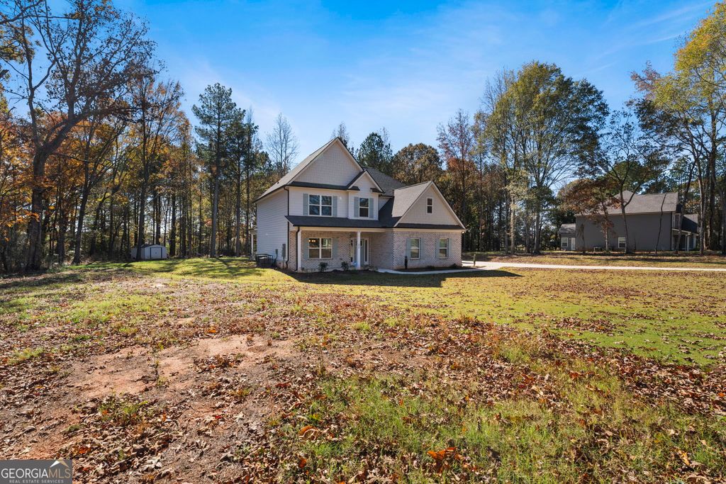 Photo of 656 East Lake Road, McDonough, GA 30252 (MLS # 10704160)