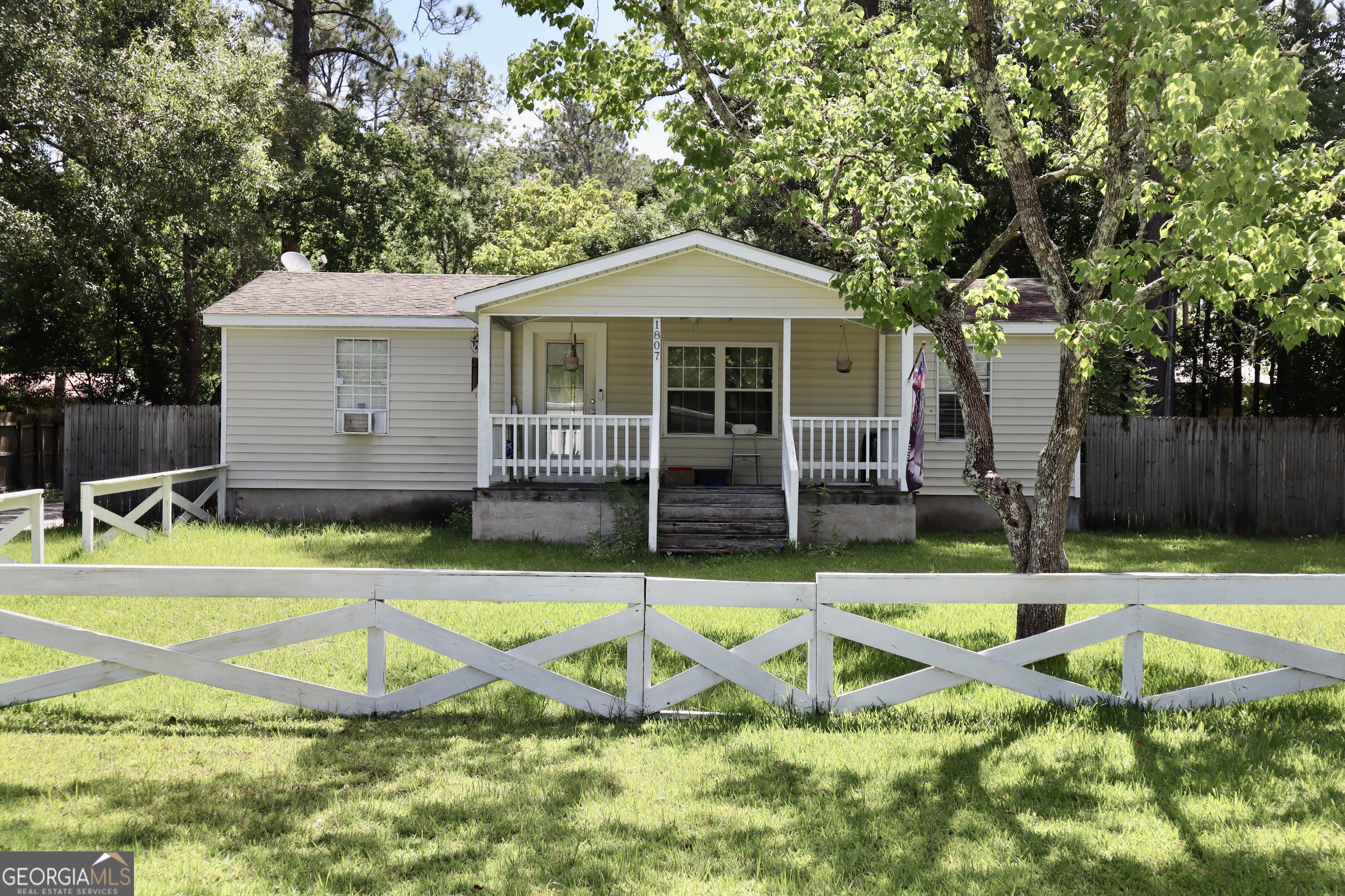 Welcome to this Charming 3 bedroom 2 bath mobile home ready for new owners. This Home Feathers Open split floor plan with all new Sheetrock walls with added insulation and newly installed flooring. Walk outside to your private fenced in yard with a great Front and back porch great for entertaining or just a relaxing day. A Very spacious workshop that provides plenty of storage space or just a great space for your next project. Don't miss out on this one!!