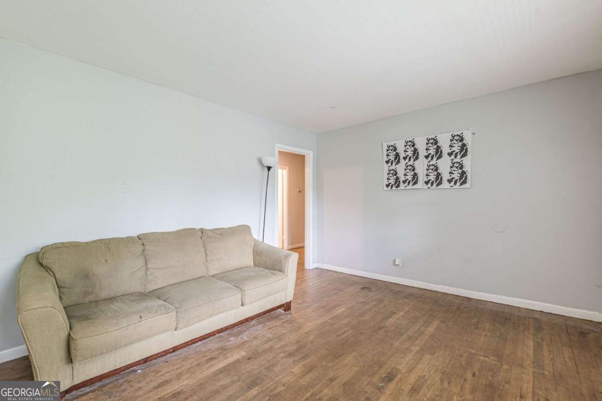 Room for rent. Only $795 per month!! There is another roommate (the owner). Located Right Next to Marta Stop and Plenty of Parking in Driveway or On Street! Welcome to this beautiful WestView Gem! This home has three spacious bedrooms, one full bathroom, and a garage! Minutes away from Lee and White, West-End Park, Mozley Park, the Beltline, the AUC center and more!! This is an excellent opportunity for an AUC center student looking for a home near campus, as the rent can be shared up amongst roommates! Location, location , location!!! There is a new development coming soon at Murphy Avenue. Additionally, the Marta Station is walking distance from the property! 350 Brooks is literally minutes away from Interstate I-20, Georgia Tech, Centennial Olympic Park, the Mercedes-Benz Stadium, the Georgia Aquarium, Midtown/Downtown and other large attractions. This home sits on a hill, has hardwood floors throughout the entire property, and did I mention a FULL BASEMENT. This home has an open floorplan with a beautiful kitchen including an island/breakfast bar. There is extra storage in the basement of the home, if needed or if downsizing from a larger home. So no need to purchase a storage unit!! There's also additional room for storage in the crawlspace and in the garage. This home is ready for immediate move-in. Don't let this opportunity miss you! Schedule a showing and apply soon.