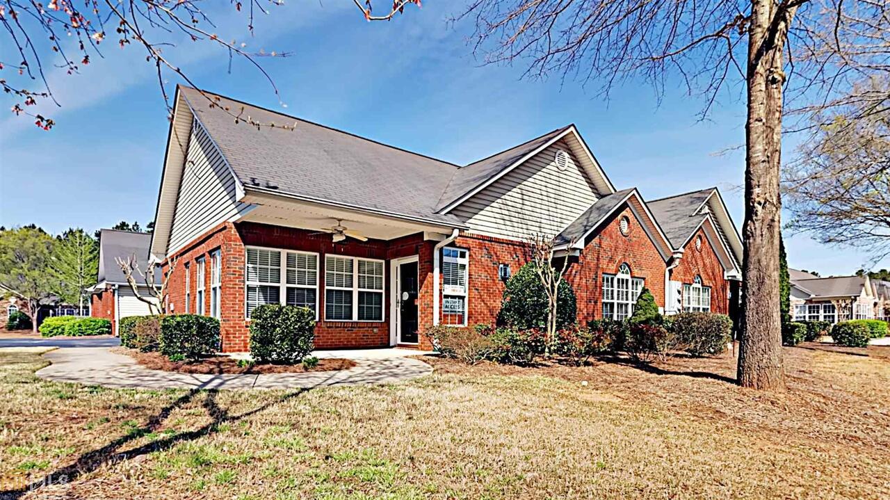 Beautiful 2BA 2BA condo located in 55+ community in Powder Springs. Fresh two toned interior paint. New carpet throughout. Open floor plan with vaulted ceiling and fireplace in family room. Eat in kitchen offers new stainless steel appliances. Master bedroom accents trey ceiling and private bath. Two car garage. Walking distance to shopping and dining. Come view this home today!