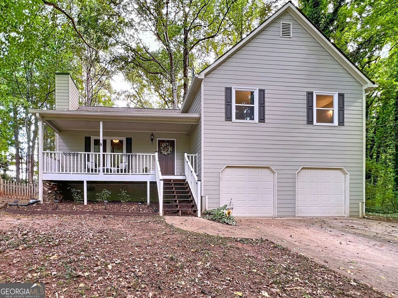Completely Updated and Ready for New Owners! Welcome to your dream home, where charm meets modern comfort! This completely updated gem comes with an incredible bonus: the seller is generously offering $10,000 towards the buyer's closing costs! This is an opportunity you won't want to miss! As you step through the front door, prepare to be captivated by the soaring ceilings and the beautiful fireplace that serves as a stunning focal point in the spacious living area. Custom built-in shelving adds a special touch. Stylish wide plank LVP flooring flows throughout the home-say goodbye to carpet! The lovely kitchen features updated appliances, new sink, and white cabinets. The remodeled bathroom in the hallway provides a fresh and inviting atmosphere. When it's time to unwind, retreat to the primary suite, along with two more spacious bedrooms upstairs, offering a perfect blend of privacy and togetherness. Plus, you'll love the added convenience of a fourth bedroom located on the lower level-ideal for guests or a home office! Imagine leisurely mornings sipping coffee on your expansive covered front porch, soaking in the peaceful surroundings. The generous fenced-in yard is an entertainer's dream, complete with a deck perfect for summer cookouts and outdoor gatherings. With no HOA and no rental restrictions, the possibilities are endless! But it's not just the aesthetics that shine; this home has been meticulously maintained and updated with all major mechanicals taken care of in recent years. You can rest easy knowing that it boasts a new roof, a new HVAC system, a new water heater, and all siding replaced with durable Hardi Plank. Energy-efficient vinyl windows, new garage doors, and new exterior doors add to the peace of mind and functionality of this charming abode. This home isn't just beautiful; it's a well-loved sanctuary waiting for you to make your own memories. The only thing missing is you-come see it today and envision your life in this delightful space! Professional Photos available 9/9/25. Available for showings 9/10/25.