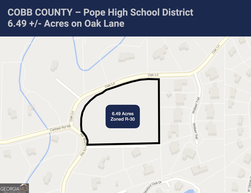This prime property is now available in the highly sought-after Pope High School District. This parcel offers great potential for a custom or semi-custom home builder who is ready to take advantage of the limited supply of new home inventory in this district. The 6.49 acre property is located at 3650 Oak Lane, Marietta, GA 30062. The parcel is zoned R-30 in Cobb County, for 30,000 sq ft lots allowing a density of approximately 1.2 units/acre for about 8 lots. There is a sewer line and water line available to serve the property. See Marketing package for maps of these lines. The property has frontage along Oak Lane and Bill Murdock Road.  The Schools are as follows: Tritt Elementary School (Great Schools Rating 9), Hightower Trail Middle School (Great Schools Rating 9), and Pope High School (Great Schools Rating 10). Asking Price: $2,400,000