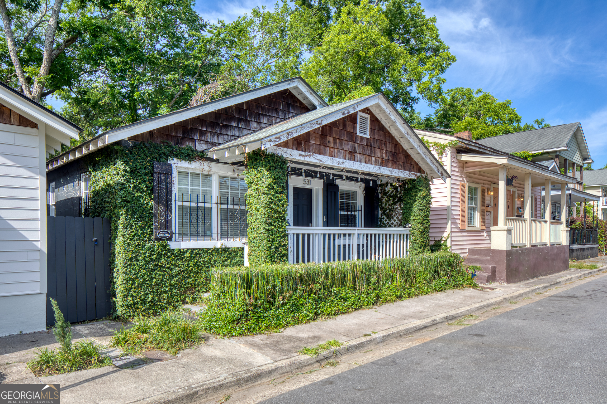 Built in 1900, this charming 2BR/1BA cottage-style bungalow offers the perfect blend of historic character and modern updates in Savannah's coveted Victorian District. Just minutes from Downtown and SCAD, 531 E 31st Street features an open kitchen with granite countertops, updated bath with marble tile and custom vanity, and original architectural details that add warmth and charm.Recent updates include electrical, plumbing, hot water heater, and washer/dryer-providing peace of mind while preserving the home's timeless appeal. The lush, fenced backyard is a true retreat, with mature landscaping and a deck perfect for relaxing or entertaining. Off-street parking adds convenience.Home can be sold furnished, making it ideal as a move-in-ready primary residence, second home, or turnkey rental. Enjoy the walkable lifestyle-close to Forsyth Park, local dining, and all that downtown Savannah has to offer!