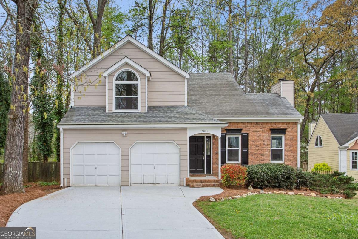 This move-in ready, 3 bedroom 2.5 bathroom home with attached two car garage and fenced backyard, located in cul de sac, is waiting for you! The main floor includes entrance foyer, family room with fireplace and vaulted ceiling, dining room with exit to an attached screened porch, kitchen with eating area, powder room and laundry room. Kitchen has near new appliances, stained cabinets and two pantries. The entire main floor has dark laminate flooring for easy maintenance and updated lighting. Upper floor includes the primary suite with walk-in closet and updated private bath with separate tub/shower. Two additional bedrooms share a full bath located in hallway. New water heater installed in 2025. New concrete driveway installed on 2024. Hardi plank siding installed and painted in 2021. New HVAC installed in 2018. New roof installed in 2017. All kitchen appliances, washer and dryer remain with the home.