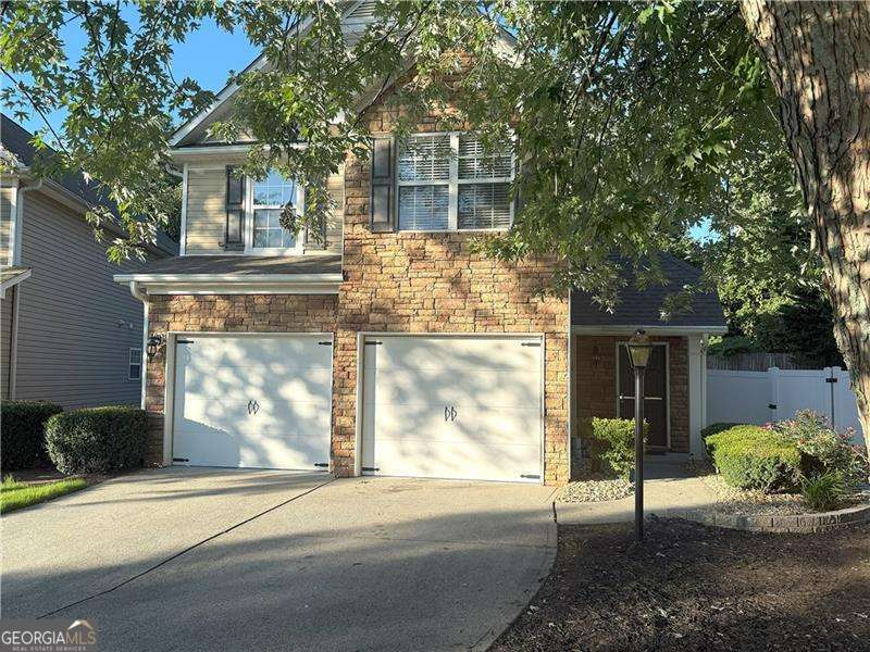 Absolutely immaculate, upgrades galore, large Master on Main open floor plan, incredible backyard! You'll fall in love with the solid cherry hardwood floors, gourmet kitchen with endless granite c-tops, built-ins, upgraded lighting throughout, beautiful Master Suite on main, two loft areas upstairs plus two spacious secondary bedrooms, large patio and huge level fence private backyard, cul-de-sac location. Great location mins to GA400, parks, shopping, resturaunts, top schools, awesome gated community with fabulous amenities! Welcome home!